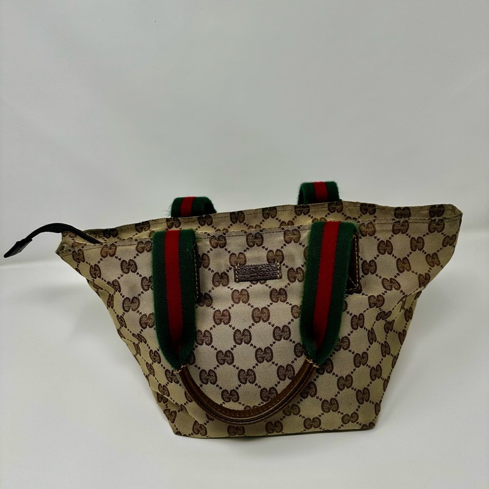 Authentic second hand Sherry Line Tote GG Canvas with leather handles.
